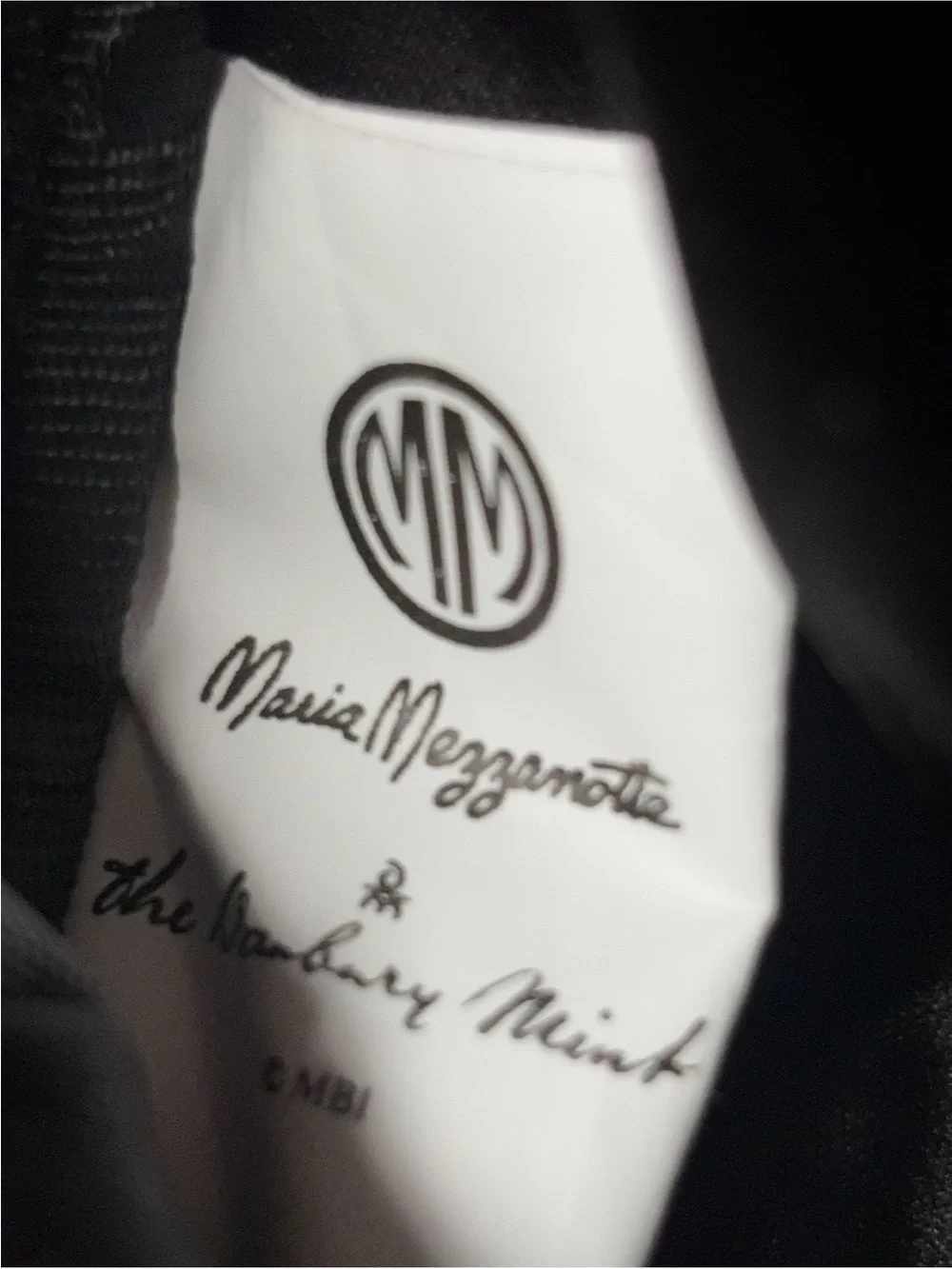 Maria Mezzanotte monogram clutch